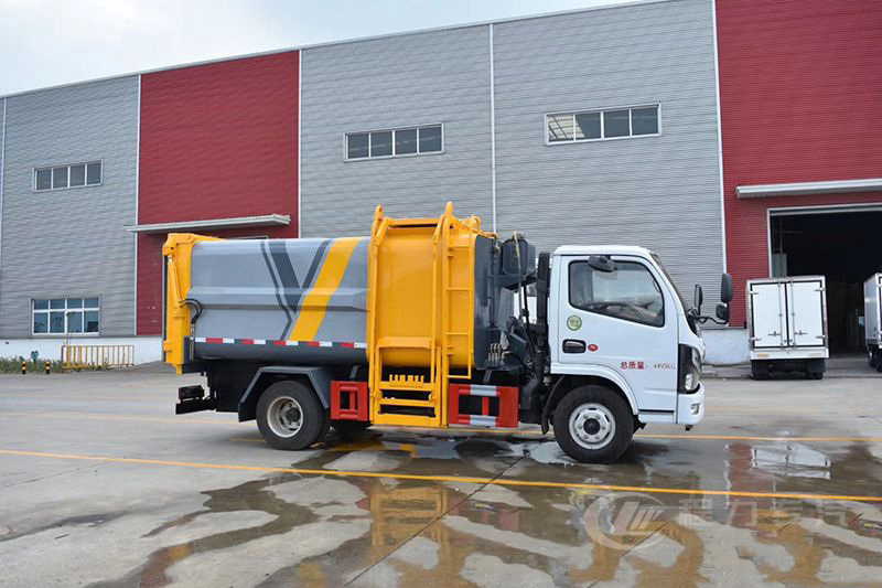 東風D6藍牌7方側裝壓縮垃圾車